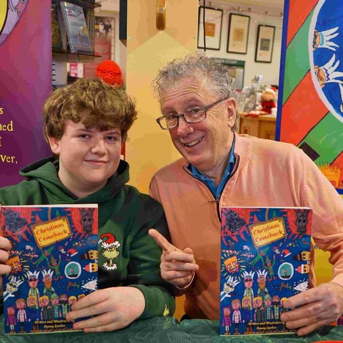 Young author Danny Lawlor pictured with journalist, novelist and broadcaster Billy Keane, at the launch of Danny's book 'Christmas Comeback', designed, edited and published by JM Agency.